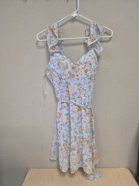 As U Wish Juniors' Floral Flutter-Sleeve Wrap Dress. 